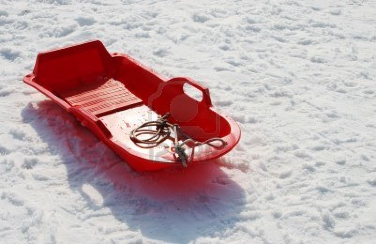 aeeb9e42feb530e2603b_red-sled-in-the-snow.jpg