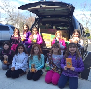 2e95e434fd2a5af8311b_Brownie_cookie_donation_to_Bridges_2016.jpg