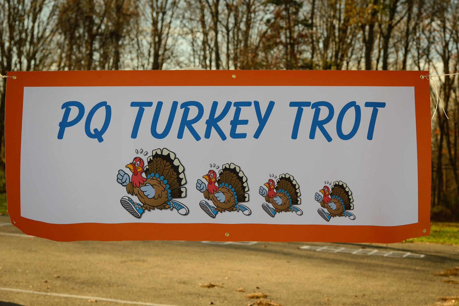 6c955f7ce66be80e03c4_PQTurkeyTrotSign.jpg