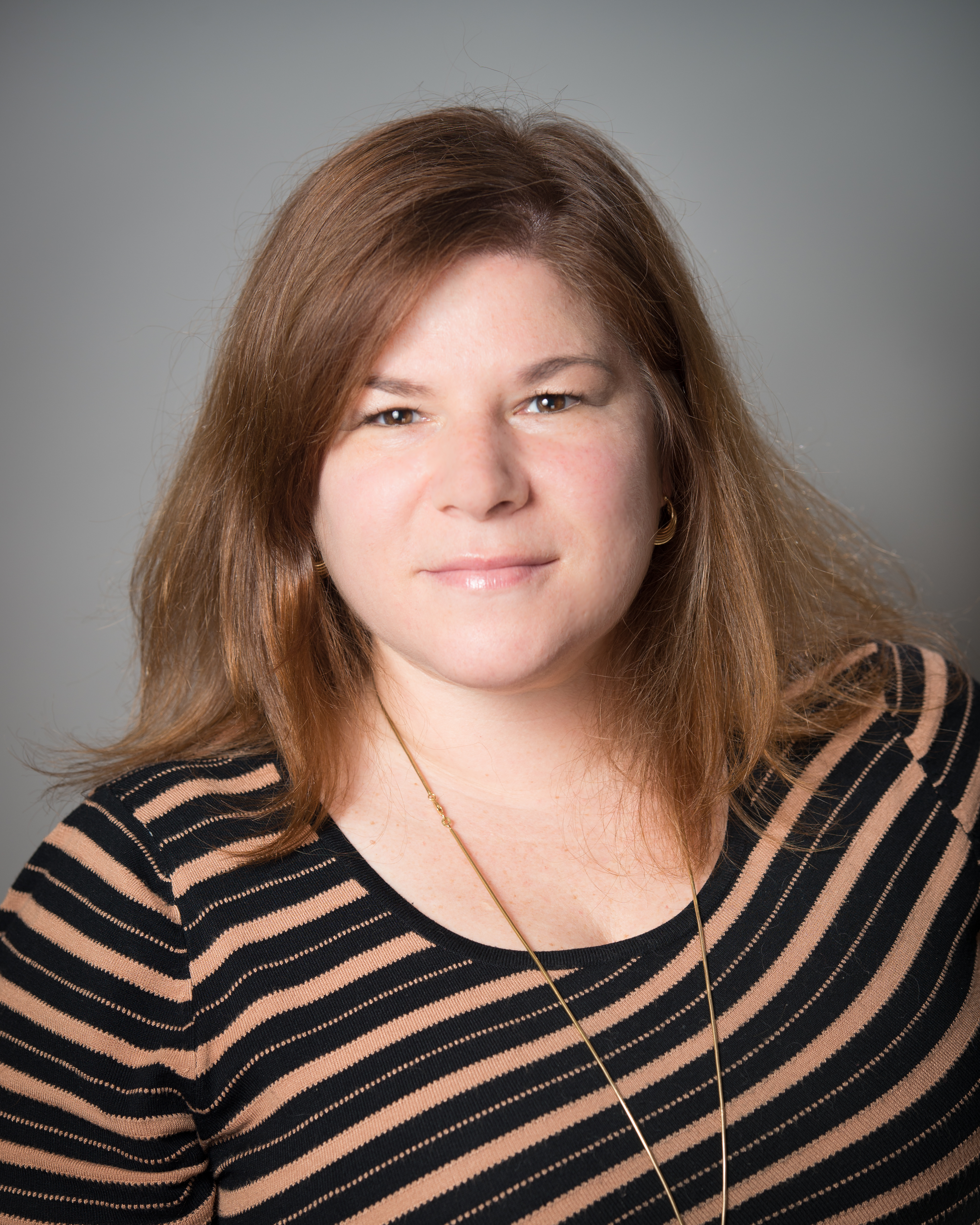31032f264bbdb0dc9f45_Headshot_Mandi.jpg