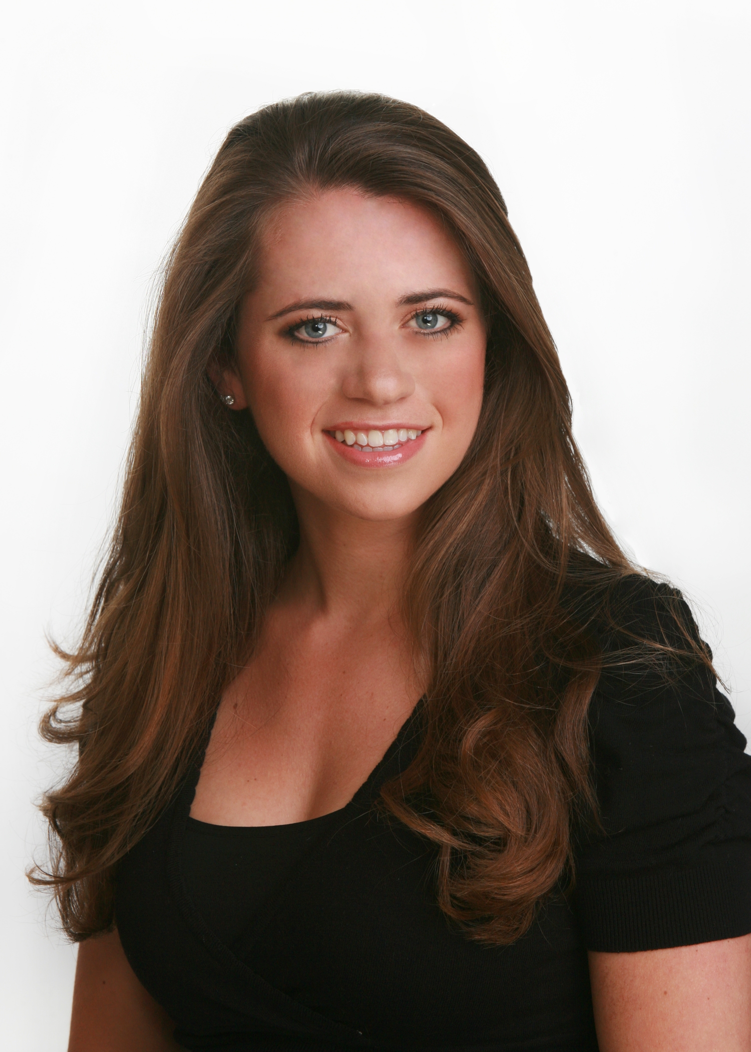 5098d82a4b2987e4ed2d_Santola_Headshot_White.jpg