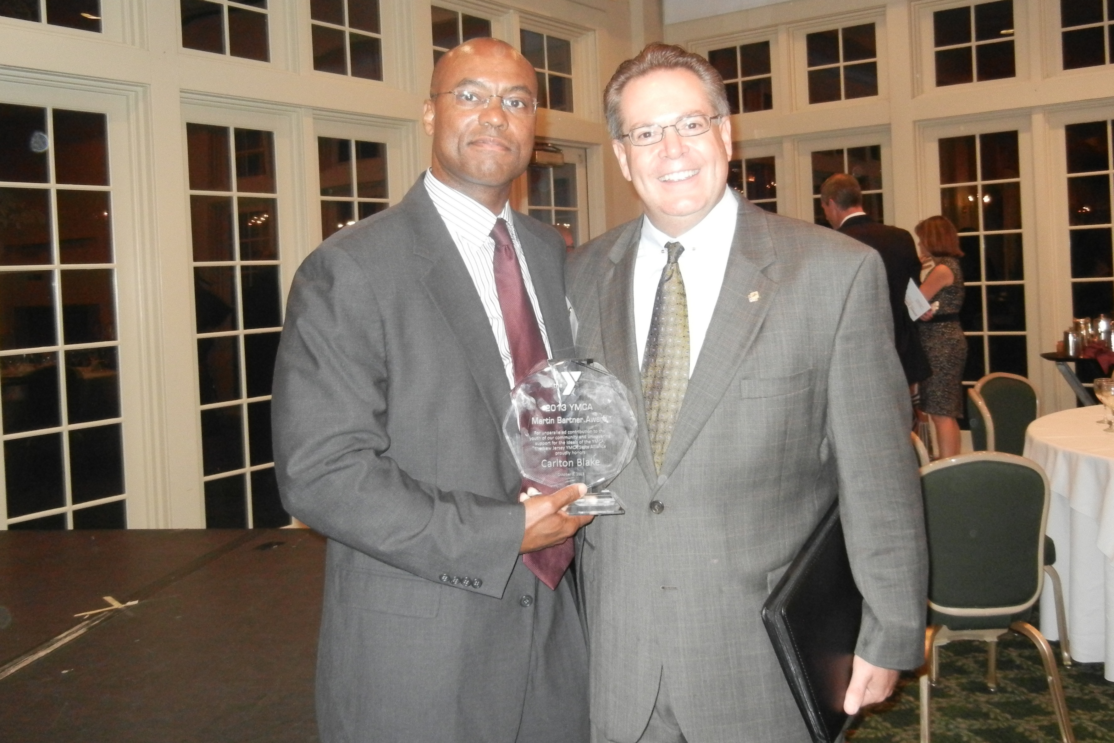 c192dae8c6e4c6181b62_Mark_and_Carlton_at_Alliance_Dinner_2013.jpg