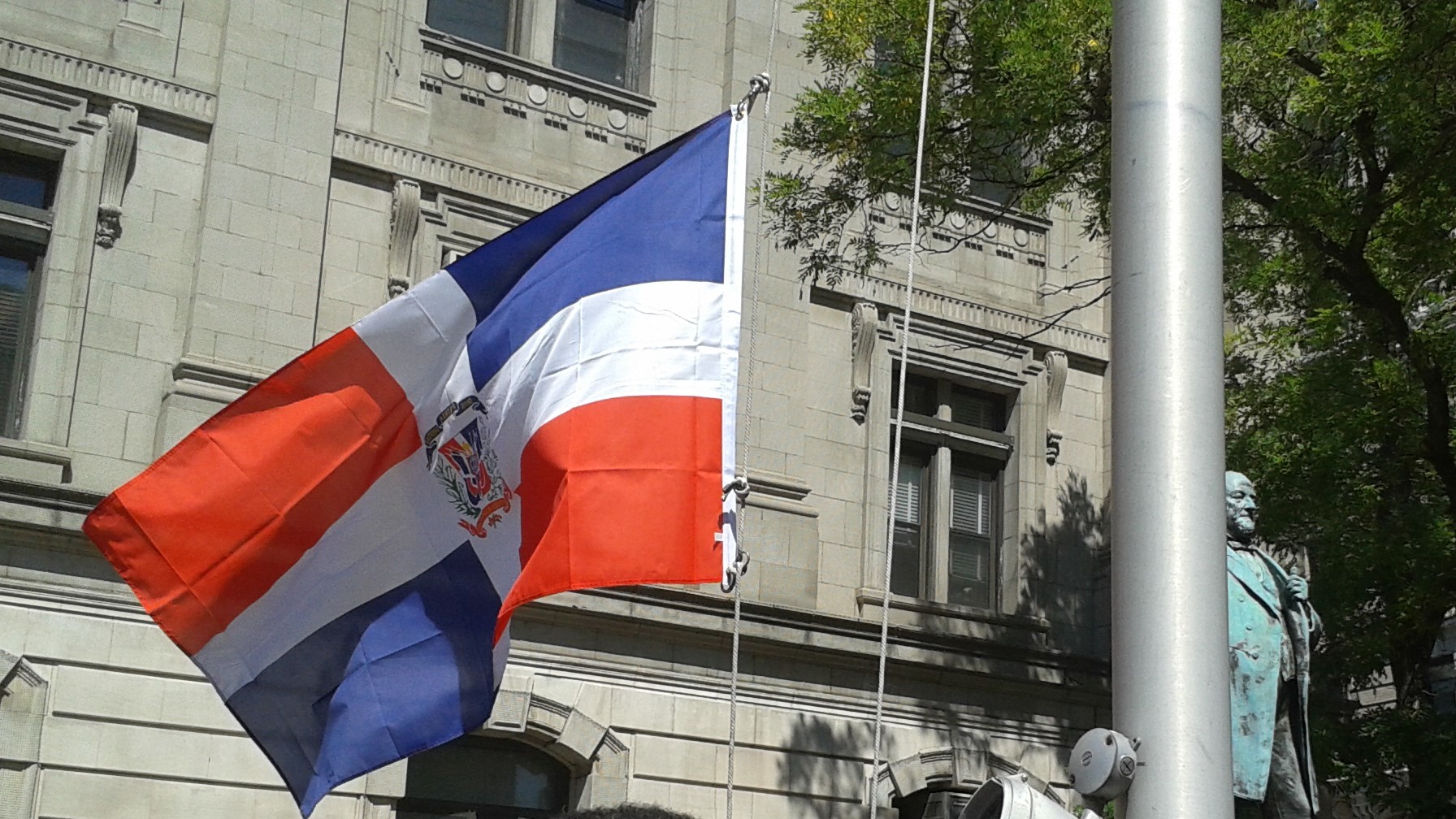 78b713c51561ebf01d74_Dominican_Flag_Raising.jpg