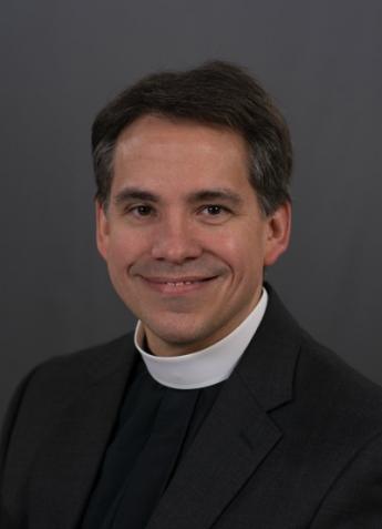 4f89a3f4936aaa67c9ec_The_Reverend_Racioppi_1_.jpg