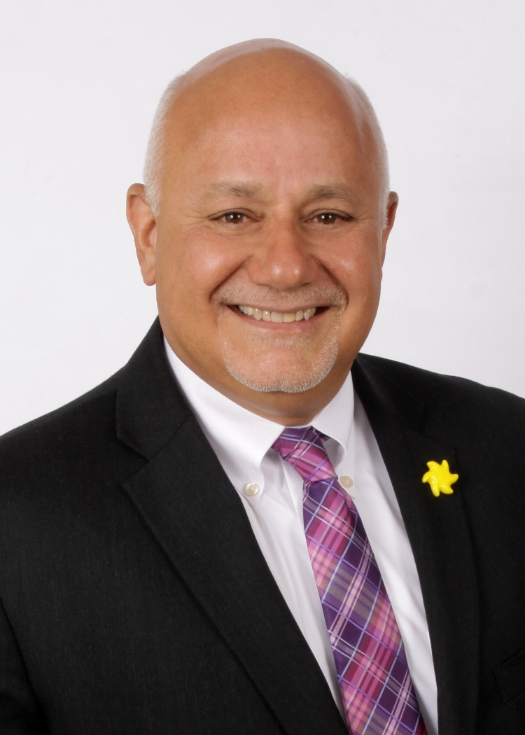 1c9f3d39f23618fec481_Guy_Headshot_2014_Print.jpg