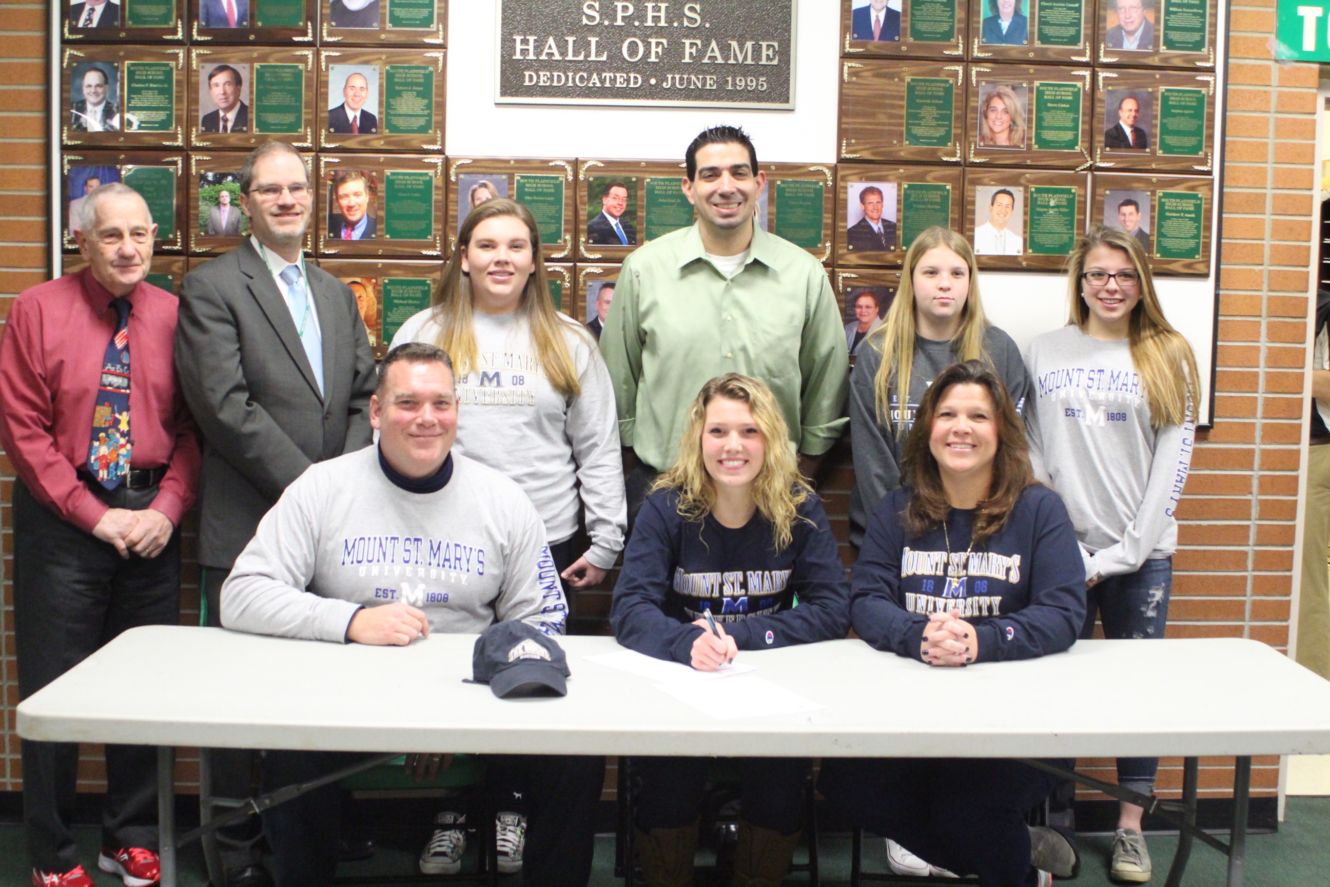 38c89b10053a515e26bd_soccer_signing.jpg