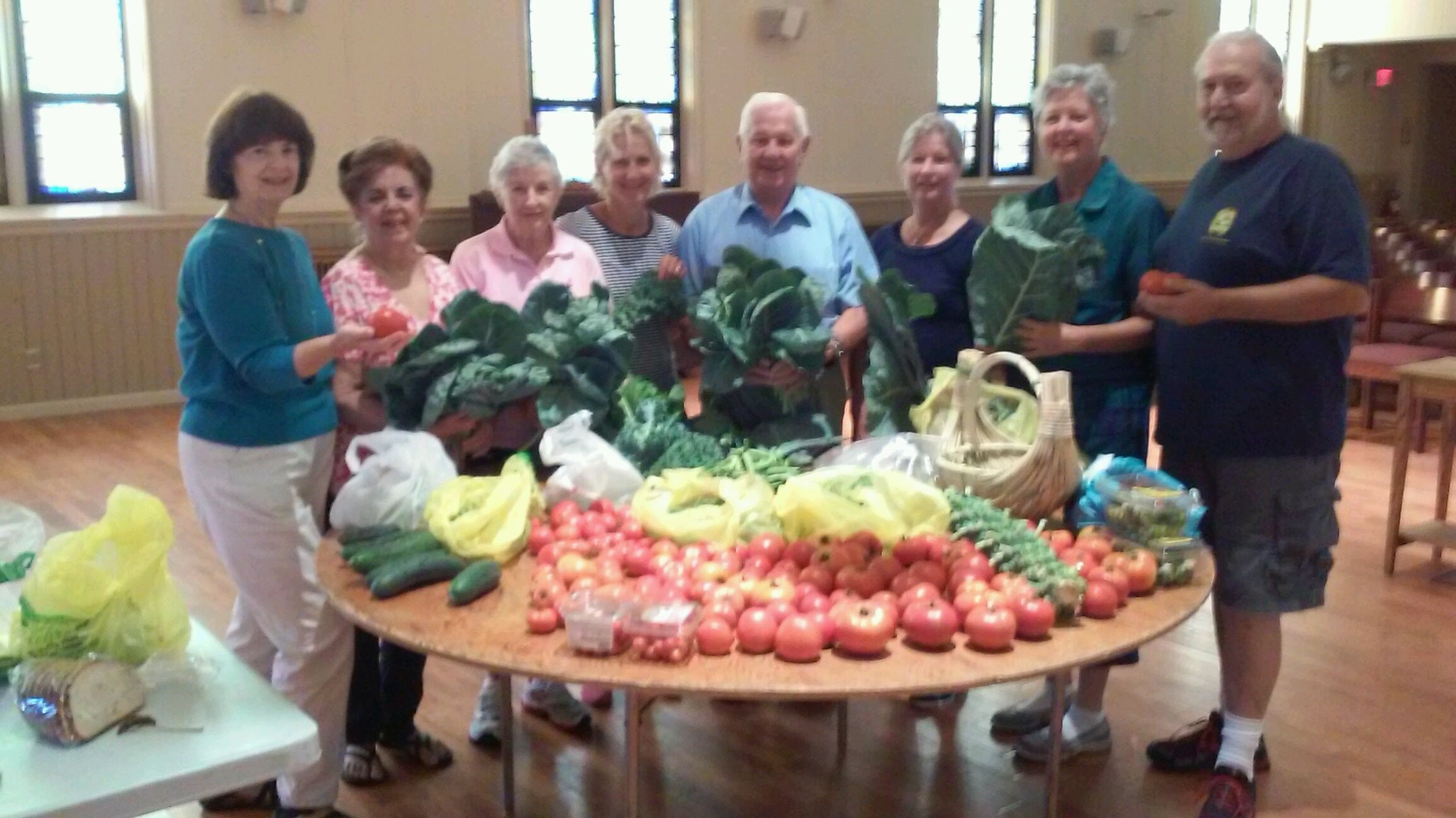 beff5fb4c49b8434e59a_Summit_Community_Garden_Bounty_for_St_Teresa_s.jpg