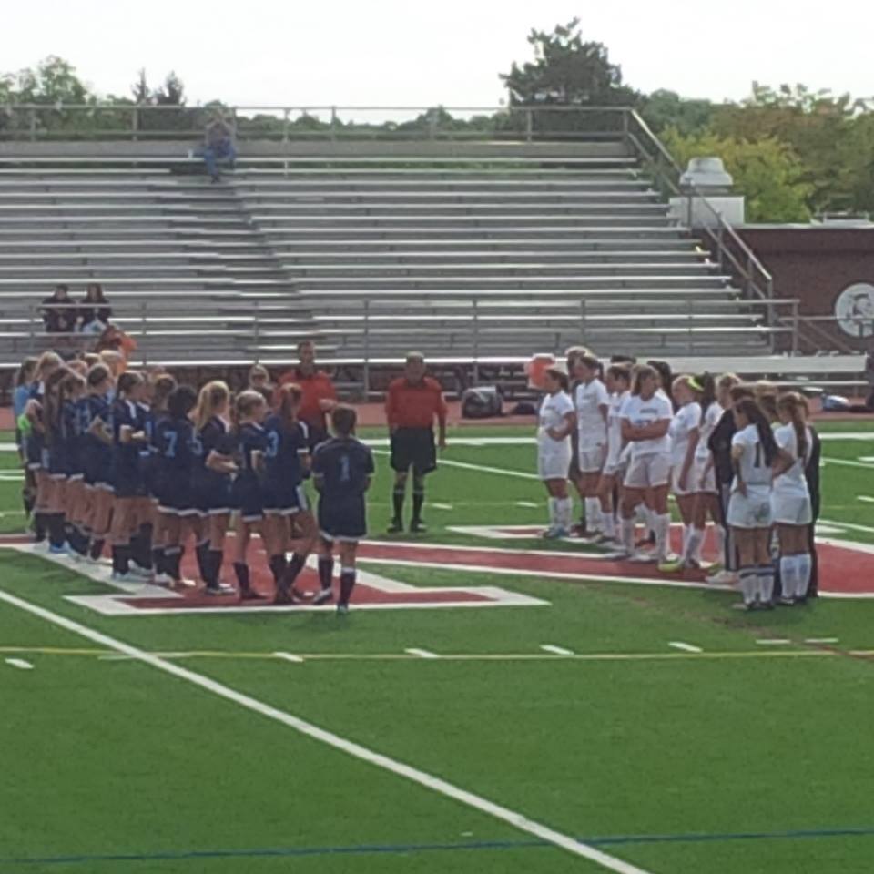 9e3567854a99b64df194_girls_soccer_huddle.jpg