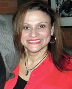 50c2934932ac7cacc828_Sonia_-_red_suit.jpg