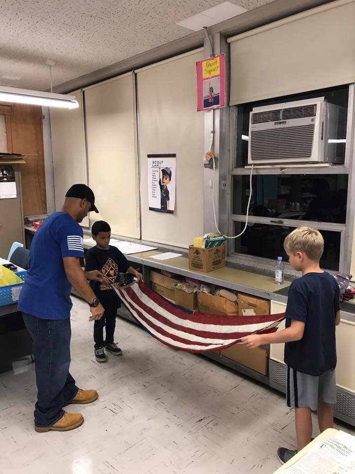 001f7d31897de0a3b04d_Flag_folding.jpg