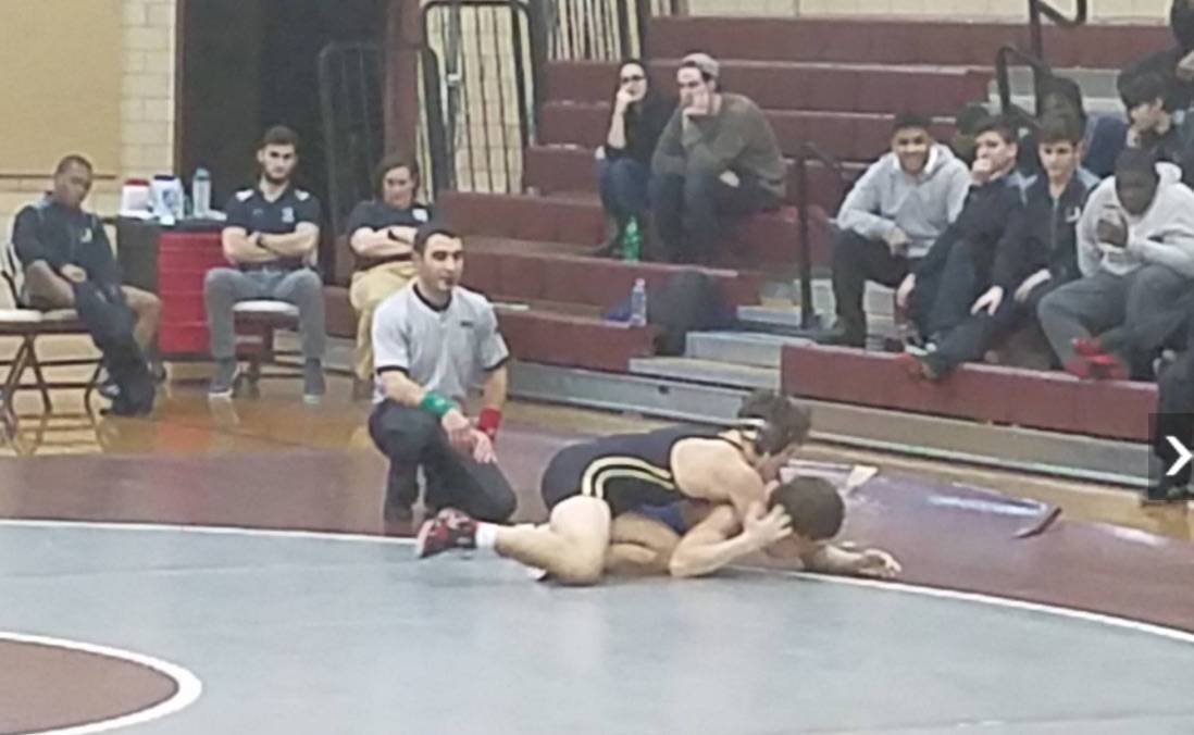0031fa60055e922d32dd_948760d12c465f4bd1ff_wrestling_II.jpg