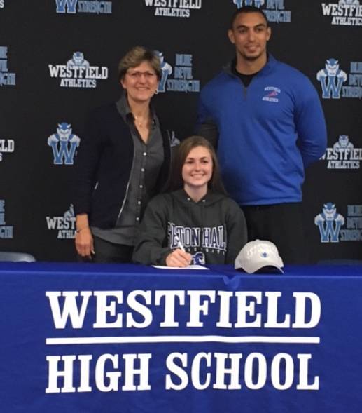 05aa5b797c60514ef647_df17a389912b40eb28b2_signing.jpg