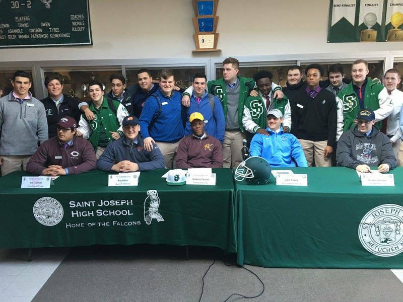 0da4d08b7f2d5158e3c6_Team_at_Signing.jpg