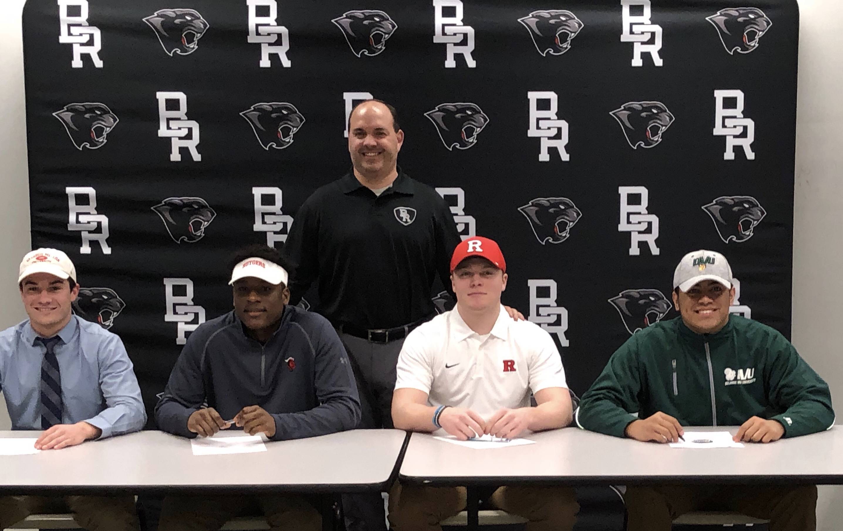 105b7de2ad752cf733b6_Football_players_signing.jpg