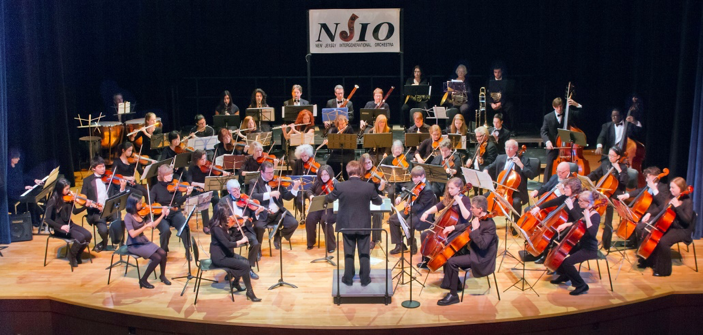 1262c8dc603c454da3d1_Photo_1_-_Maestro_Cohen_conducting_an_NJIO_performance_at_Dolan_Hall_at_The_College_of_Saint_Elizabeth.jpg