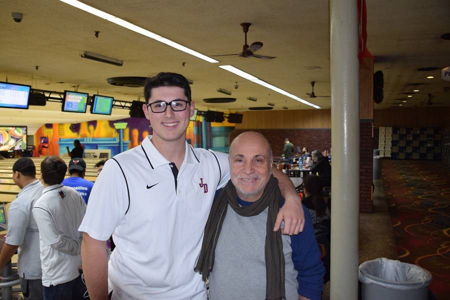 1579c8a63ec6e57483fd_BowlingEvanandCoach.jpg