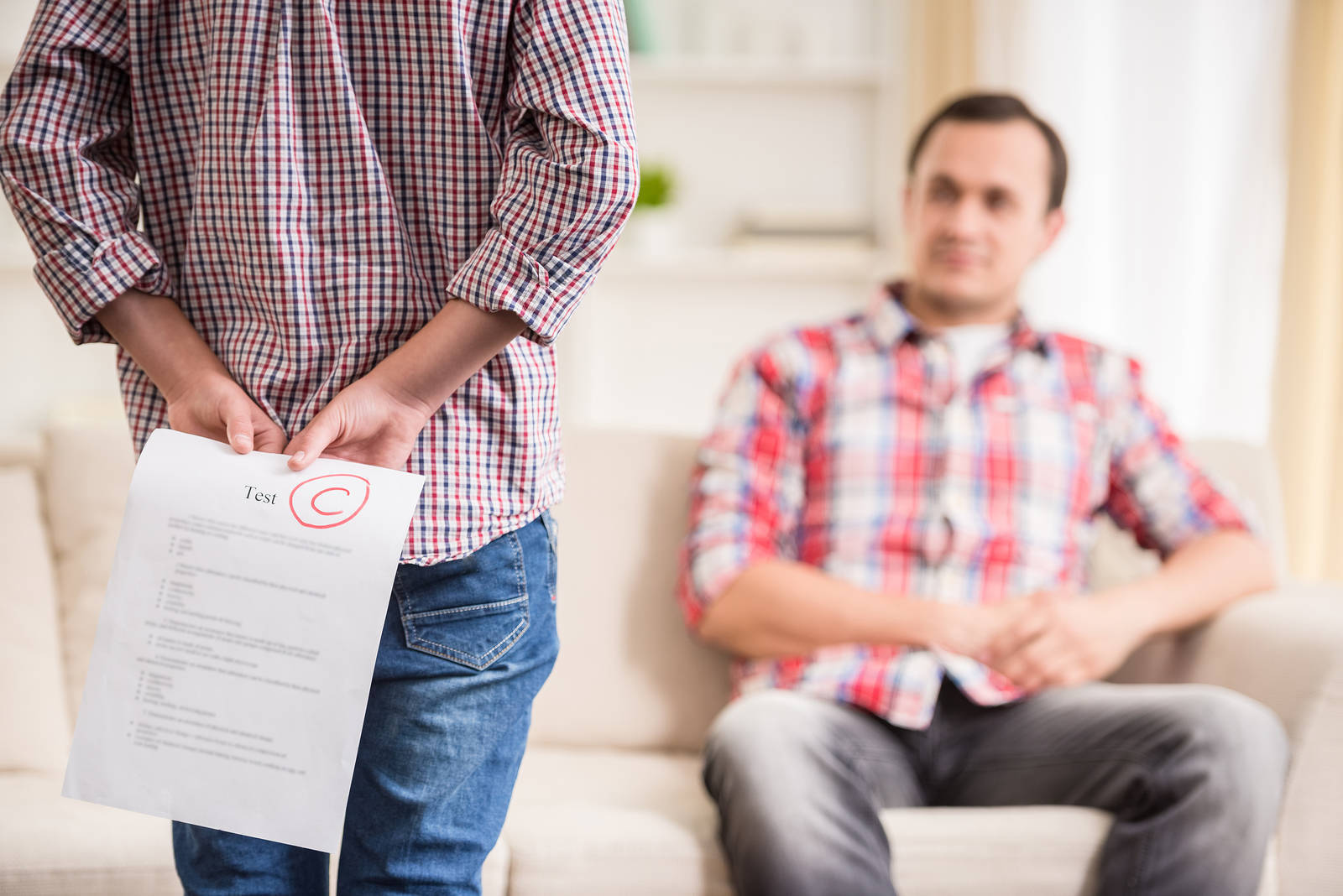 1744ac6400abc0629a21_bigstock-Father-And-Son-Grades-93260081.jpg