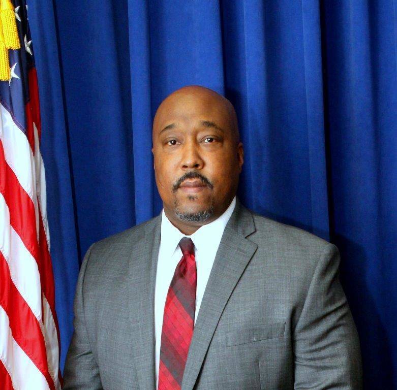 18e2646a36ba3d53121d_PHOTO_OF_ACTING_CHIEF_MITCHELL_MCGUIRE__III.jpg