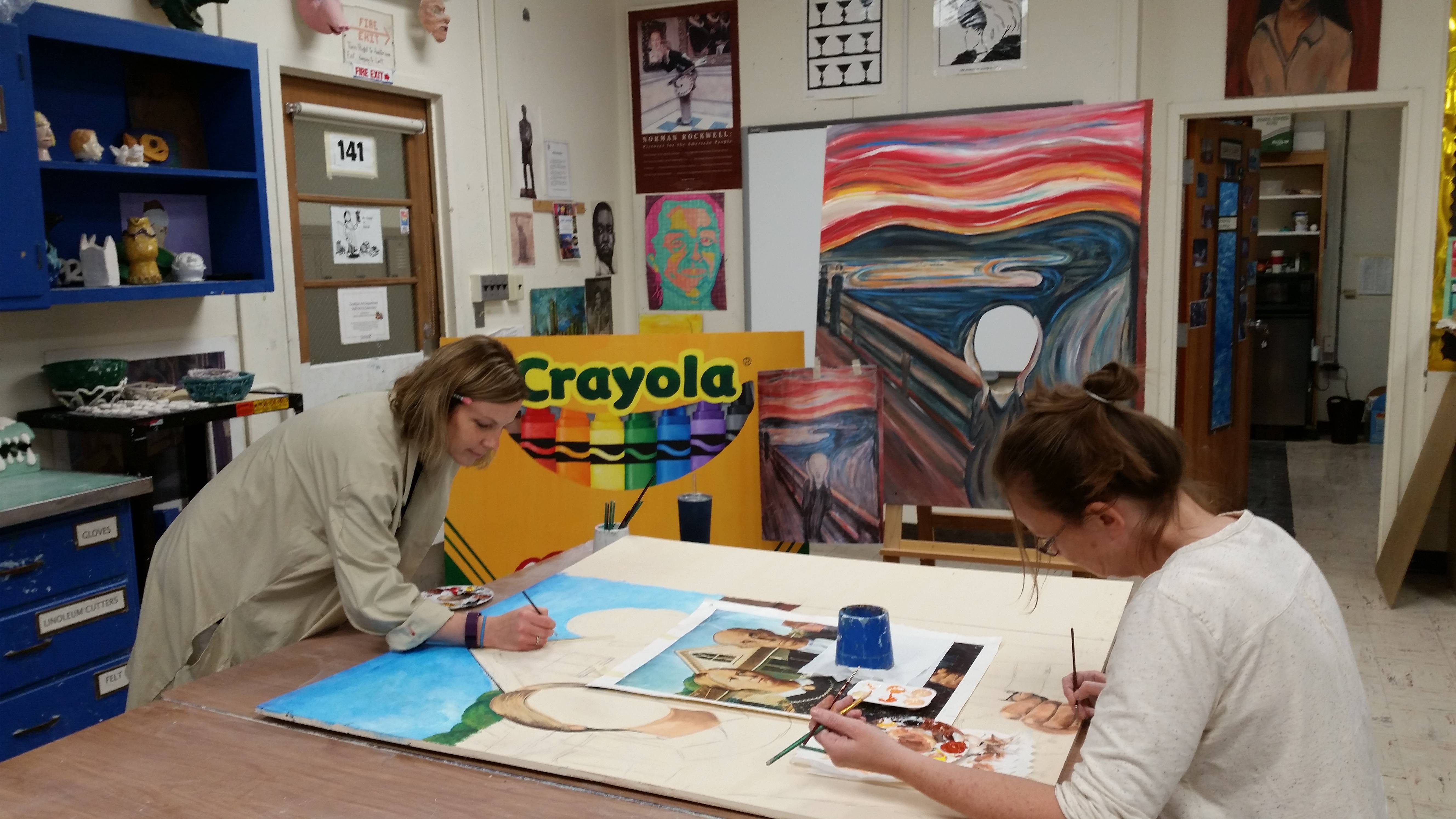 2073e45bc8ad8cffbb76_Middle_School_art_teachers_Tracy_Kovacsofsky_and_Katrina_Keeshen_work_on_interactive_displays_for_the_public_to_enjoy_at_the_fir.jpg