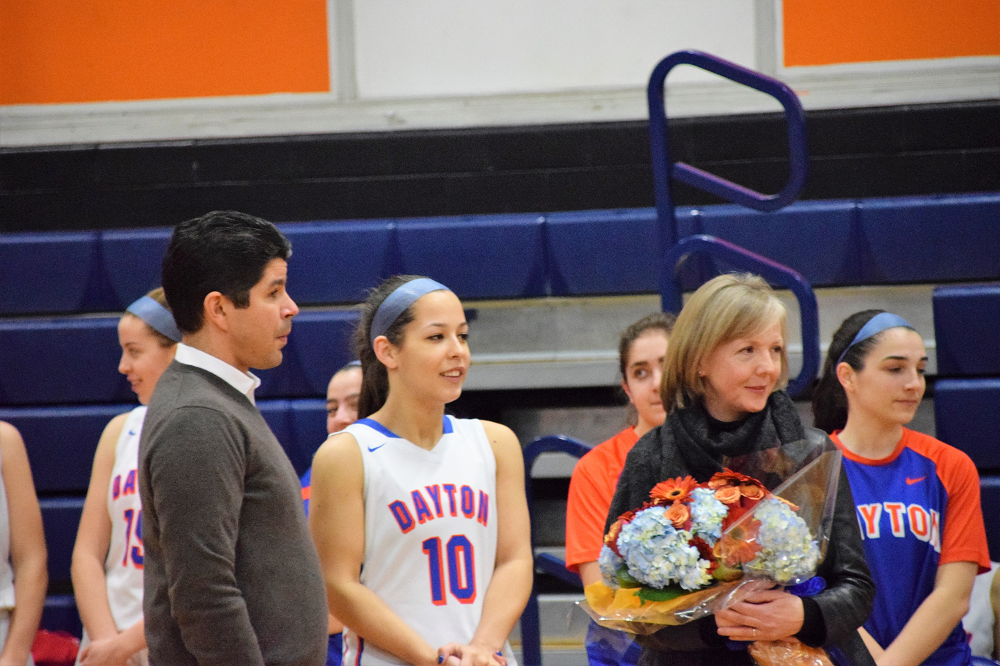 23779447ebec41f7ab02_Emma_and_Parents_pregame.jpg