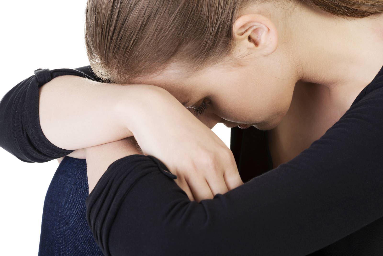 24b0cb215f969a45b5a5_bigstock-Sad-teen-girl-hunched-crying-46943326.jpg