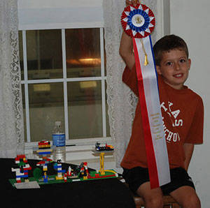 27a9c6b2f86cf9e7fb8c_824b7ec9576a6710fd18_Grange_Fair_Lego_contest_winner.jpg