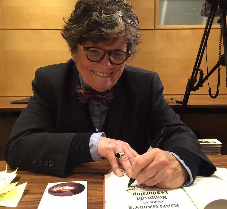 2aeea0bc1a95d469bd5c_Joan_Garry_signature.jpg