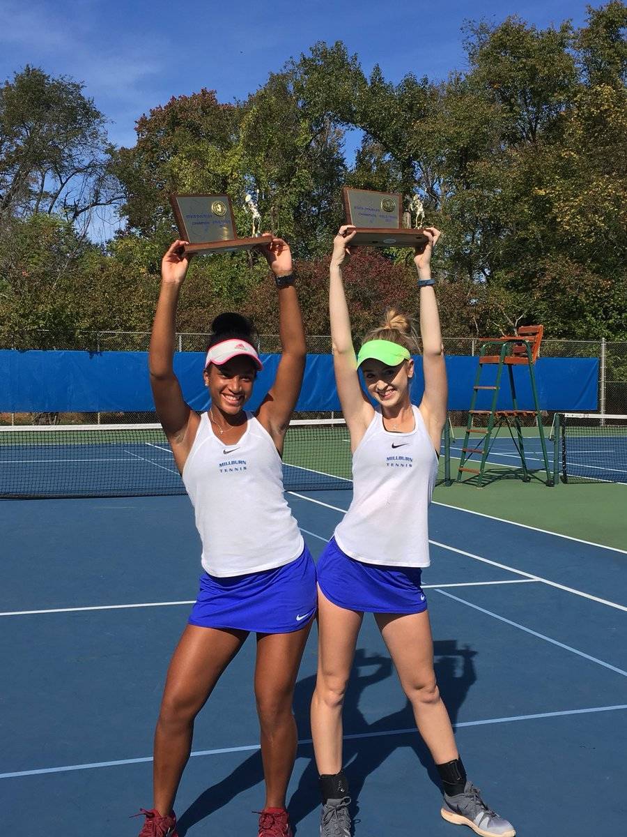 2b54707907cd46b3d347_Millburn_tennis_doubles_champs_2017_-Sara_Jacobs.jpg