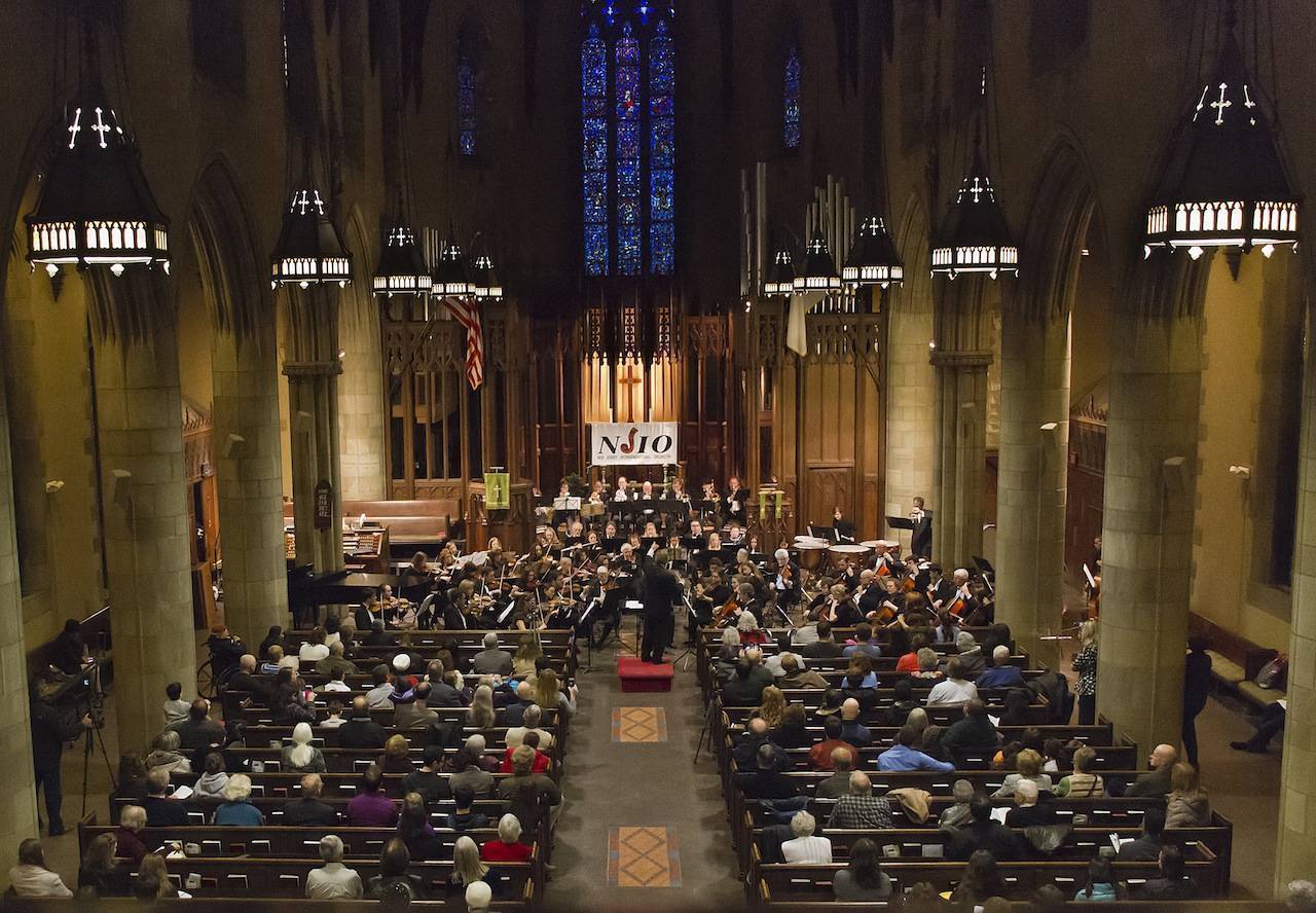 3636d23fe79e41ec9c2a_1058c6ed041340019136_Photo_2_-_NJIO_performs_in_beautiful_Crescent_Ave._Church_in_Plainfield.jpg