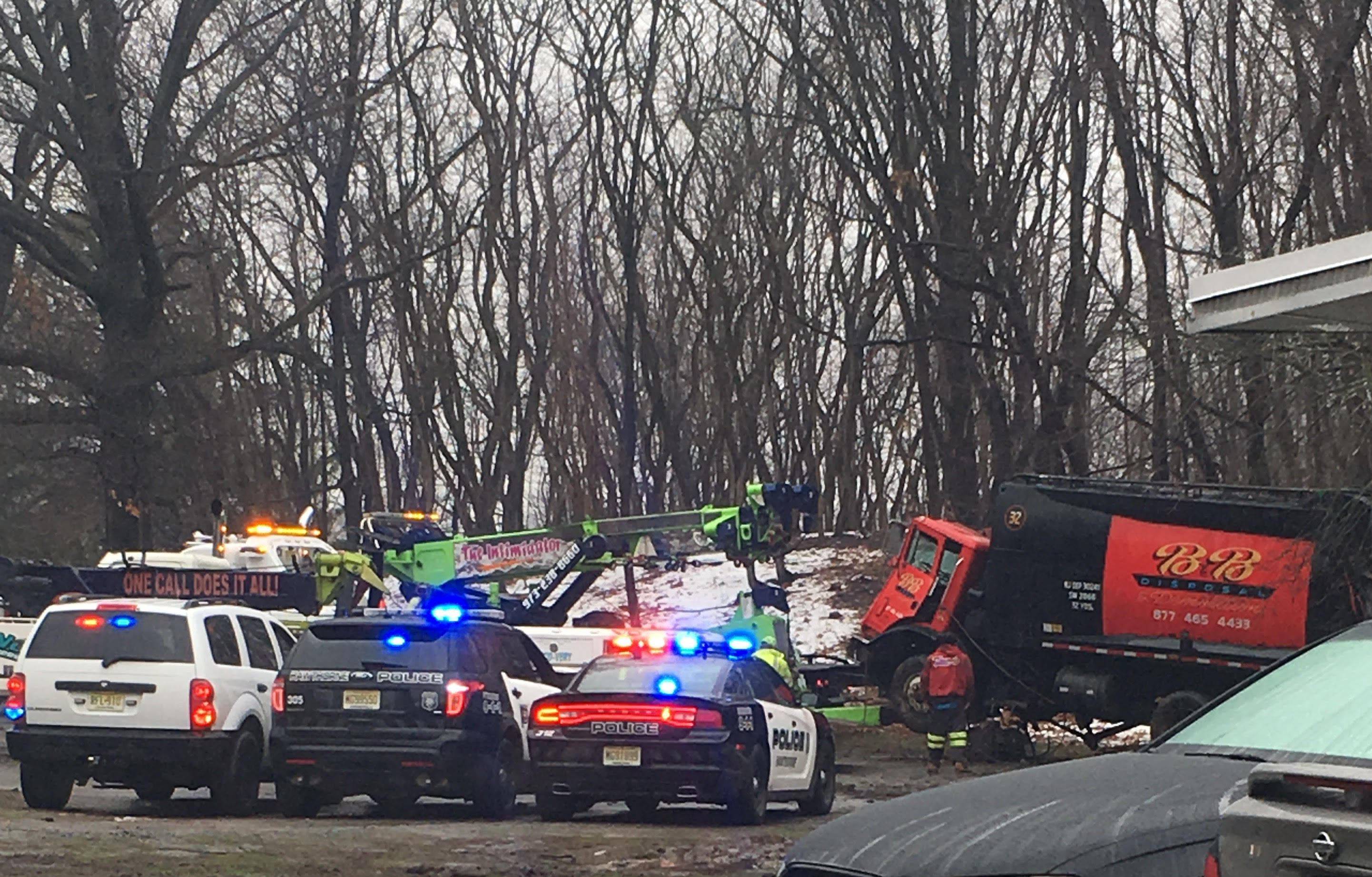 Garbage Truck Slips Down Macfarlan Avenue, Crashes into Park