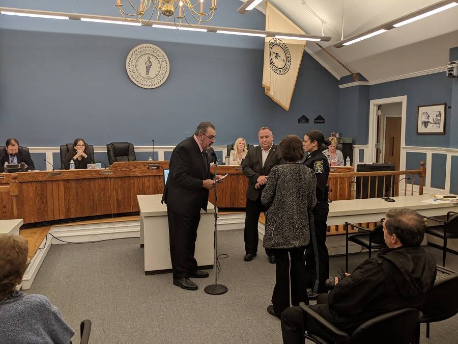 453fbb91f943c720ee67_Michelle_DiParisi_being_sworn_in_as_Probational_Patrol_Officer.jpg