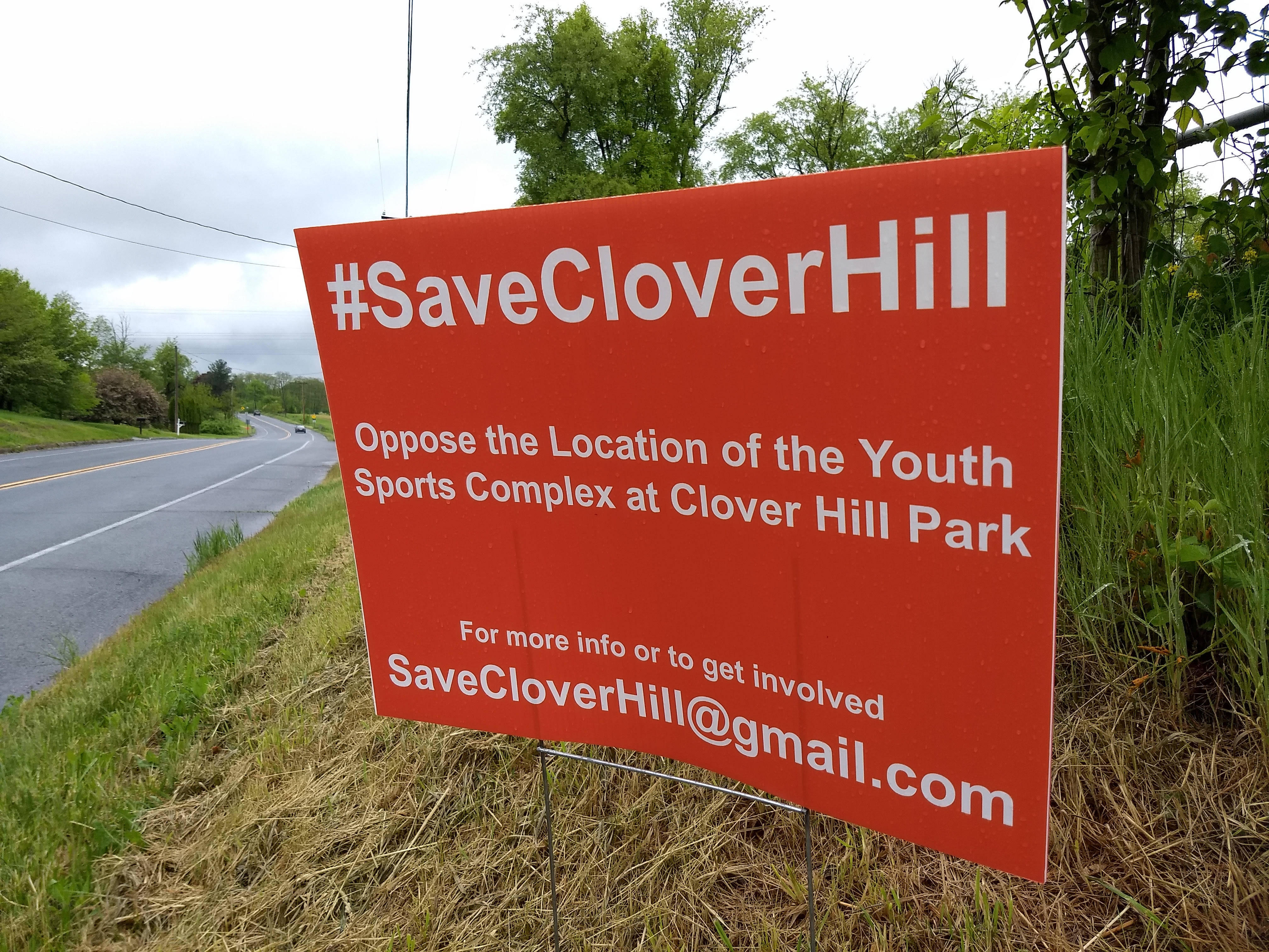 4b62c5946b9c049d54ff_clover_hill_protest_sign.jpg