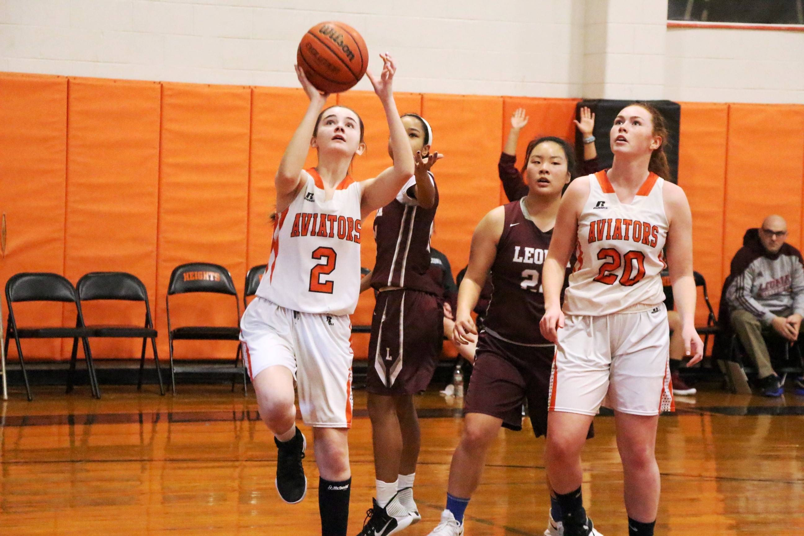 4b9a26e338b25daf5ea6_EDIT_Erin_Owen_layup.jpg