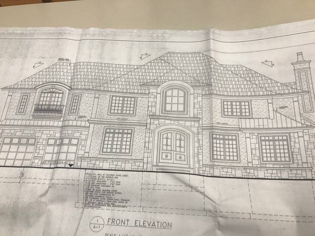 580442eb50e9d1f0e735_Zoning_Board_New_House.jpg