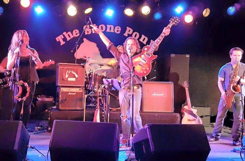 5a71c877ec5e8cacbb17_Tommy_Grasso_band.jpg