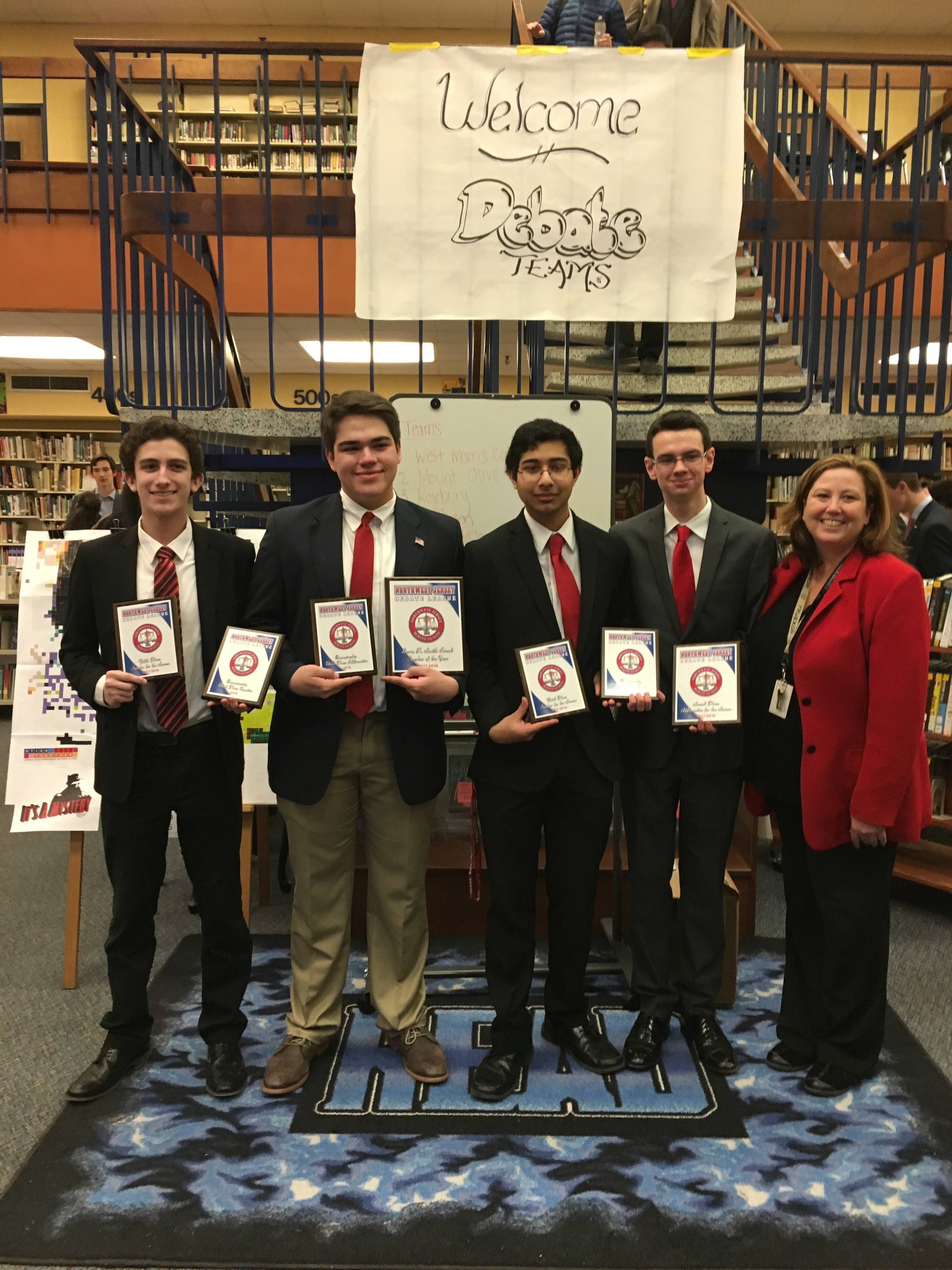 5b9d031bcd680971d7bd_0e481089a599fe907c65_2018_RHS_Debate_Team.jpg