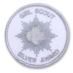 5c1141ca77a286ad925c_girl_scout_silver_award.jpg