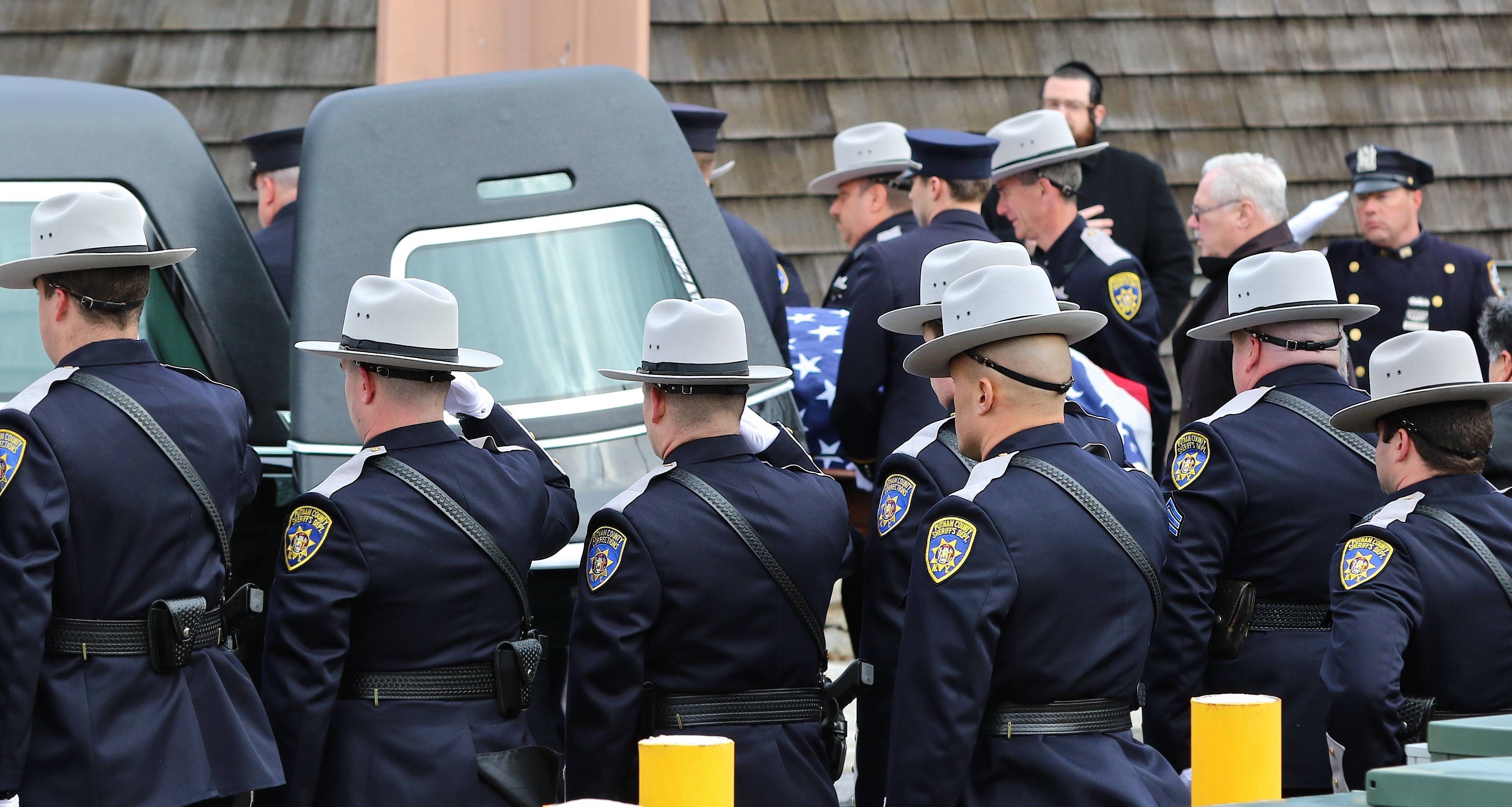 635c256227489ddf30a5_Convery_funeral_2.jpg