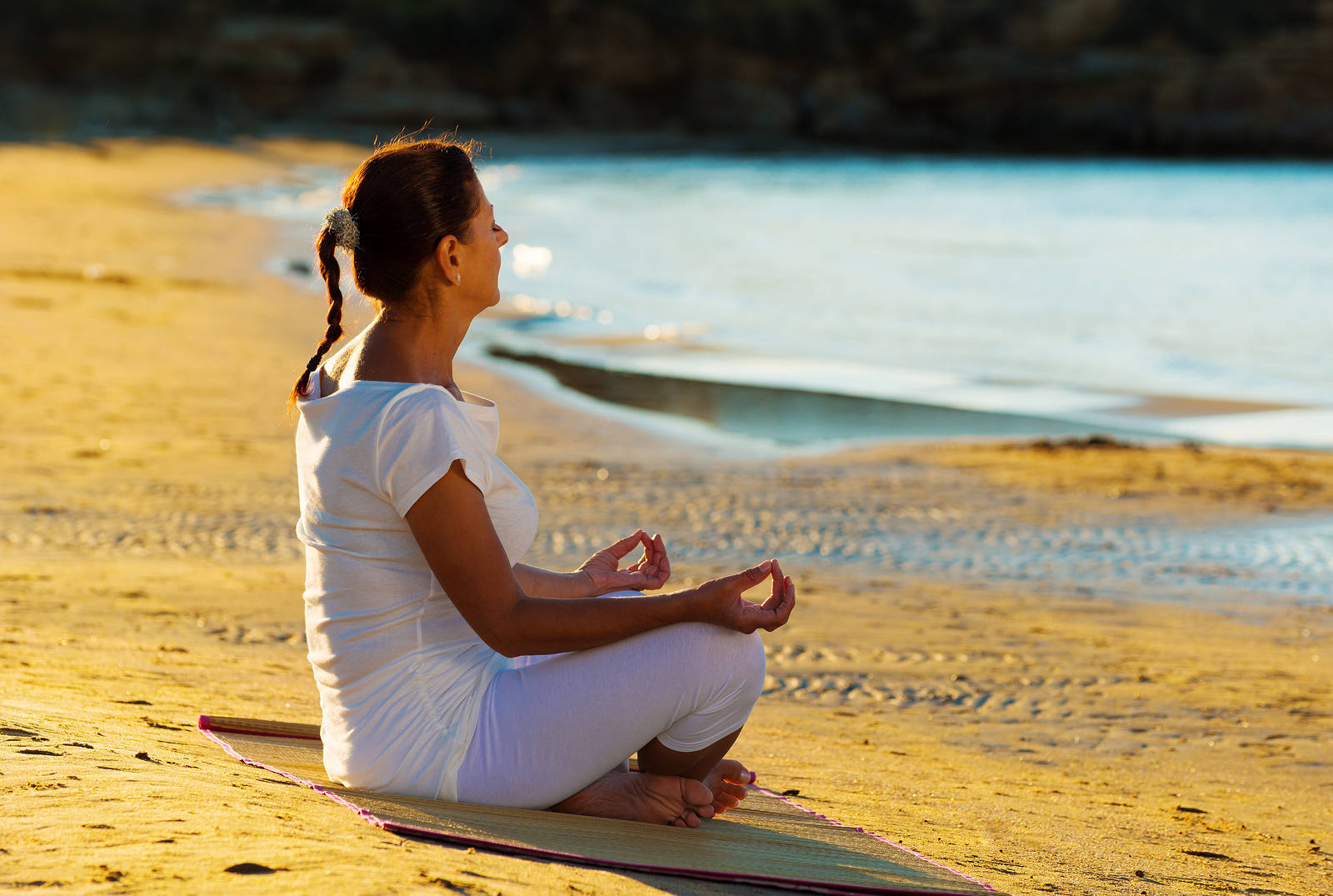 64152a86c734adbbe5f3_bigstock-_woman-yoga-onthebeach-50428325.jpg