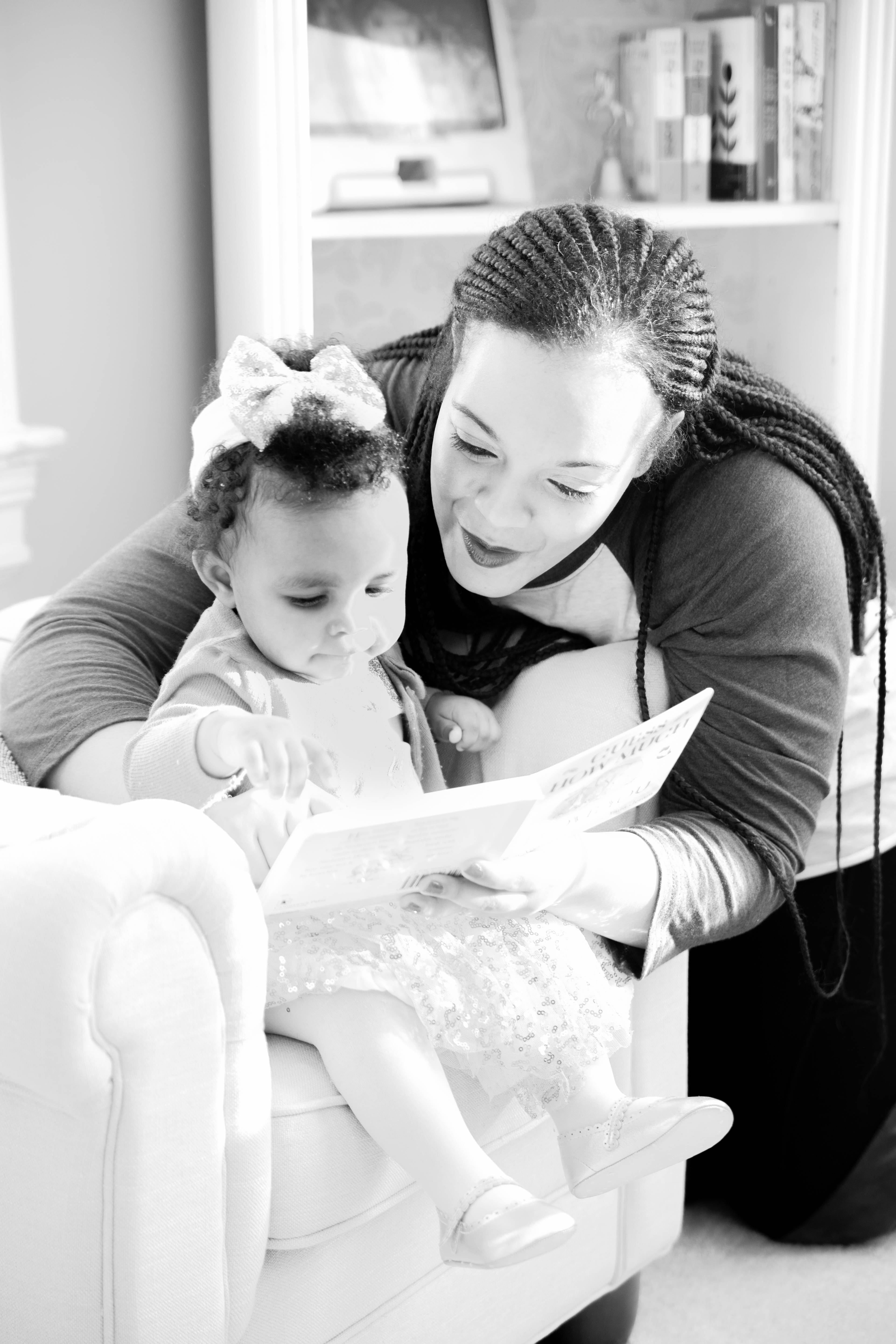 69e7b5757dd864ad09df_Mom_reading_to_Ella_BW.jpg