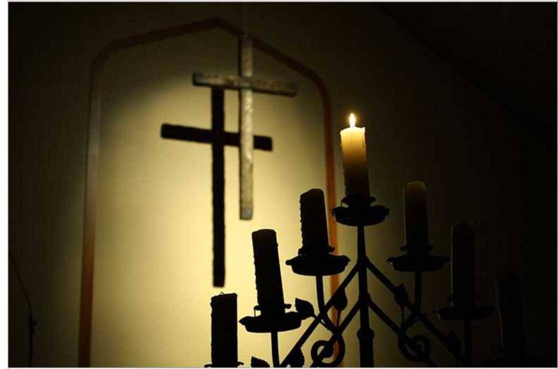 74fd66fd0b95666cc8c4_candle_cross_larger.jpg