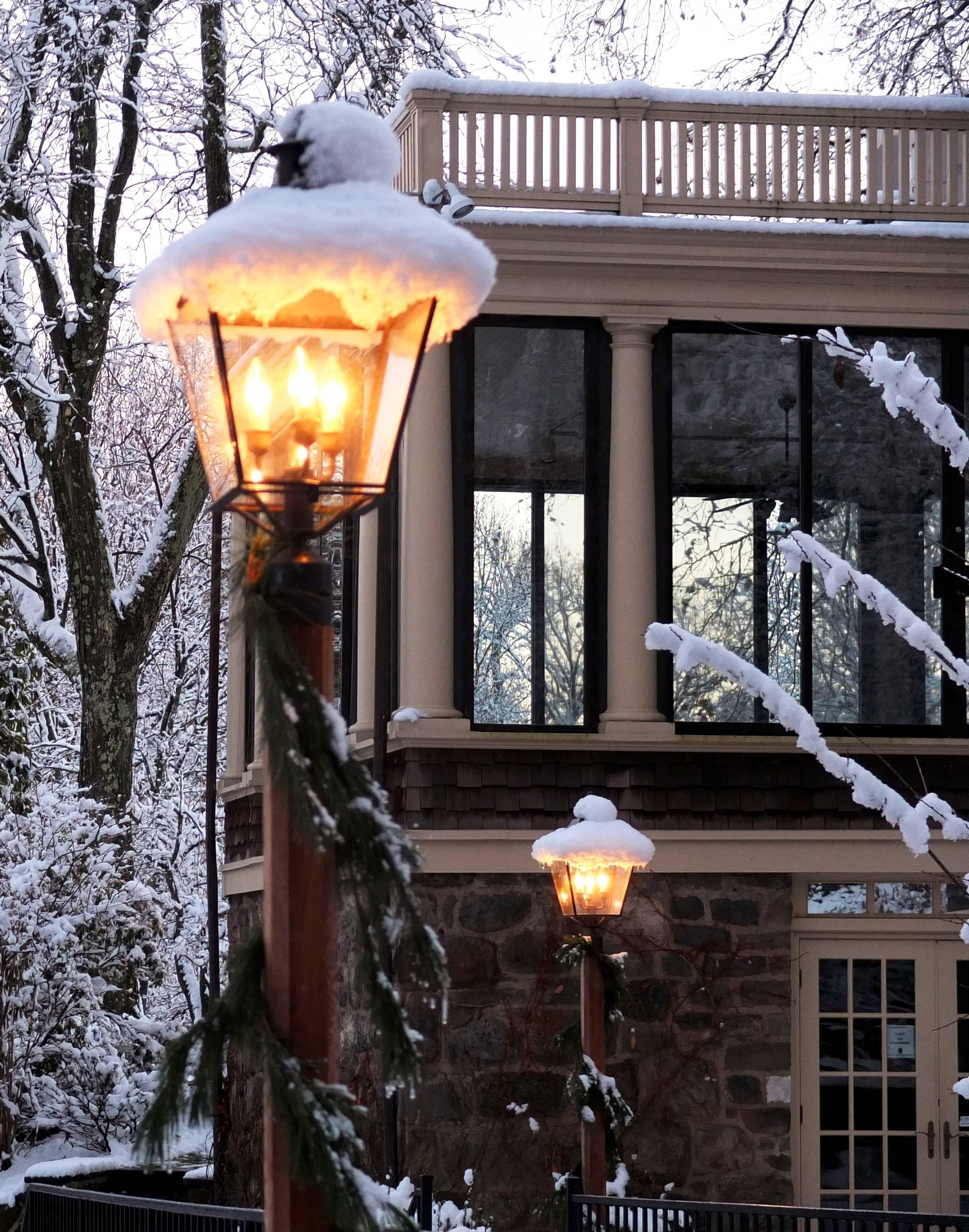 7a5b94fa4a114aef82d5_024991b6856078e8ba69_wisnerhouselanternsnow__cropped_by_MNN_for_publicity_.jpg