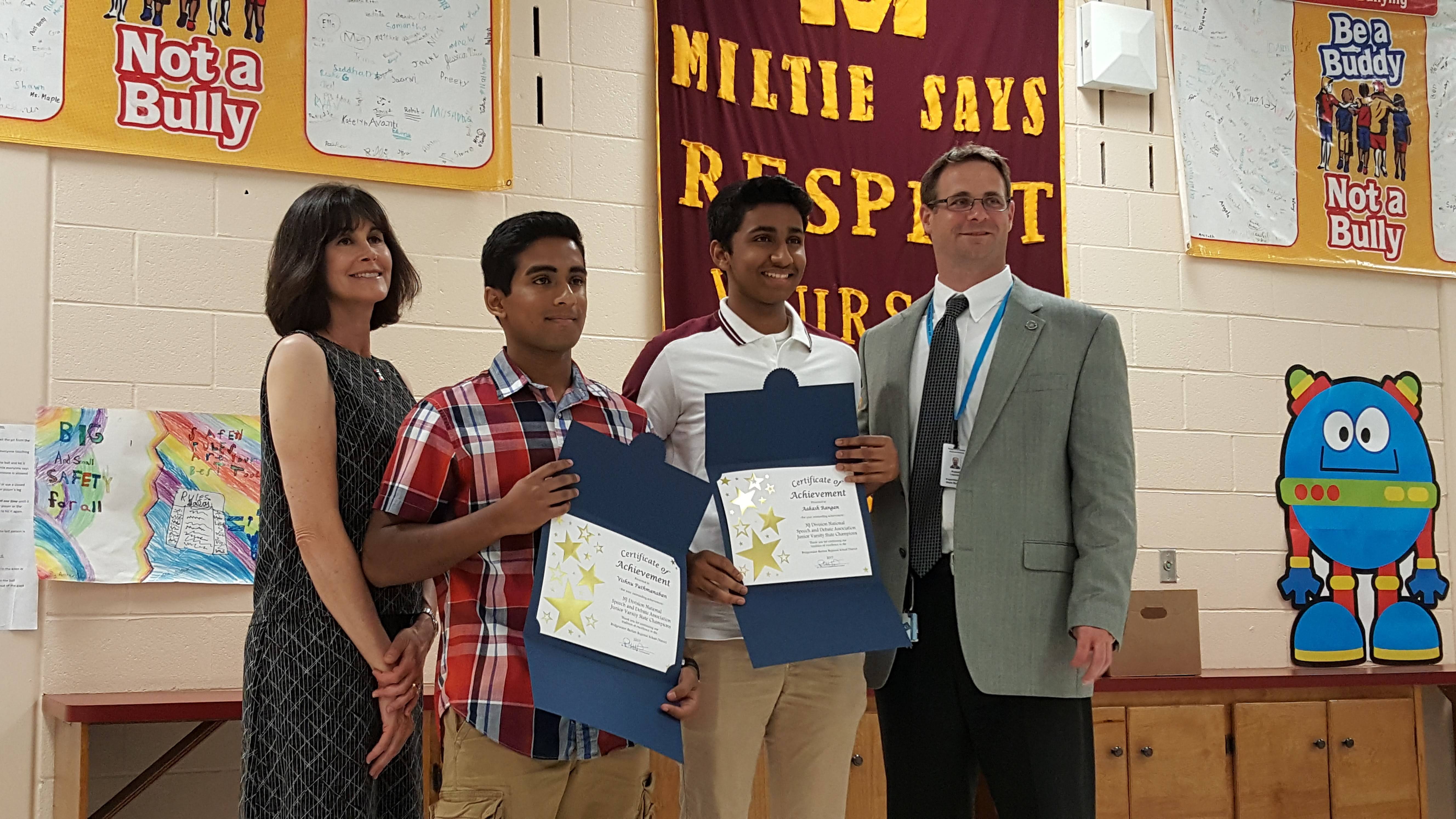 7dde14f0bf96ce8637f1_Student_debate_winners.jpg