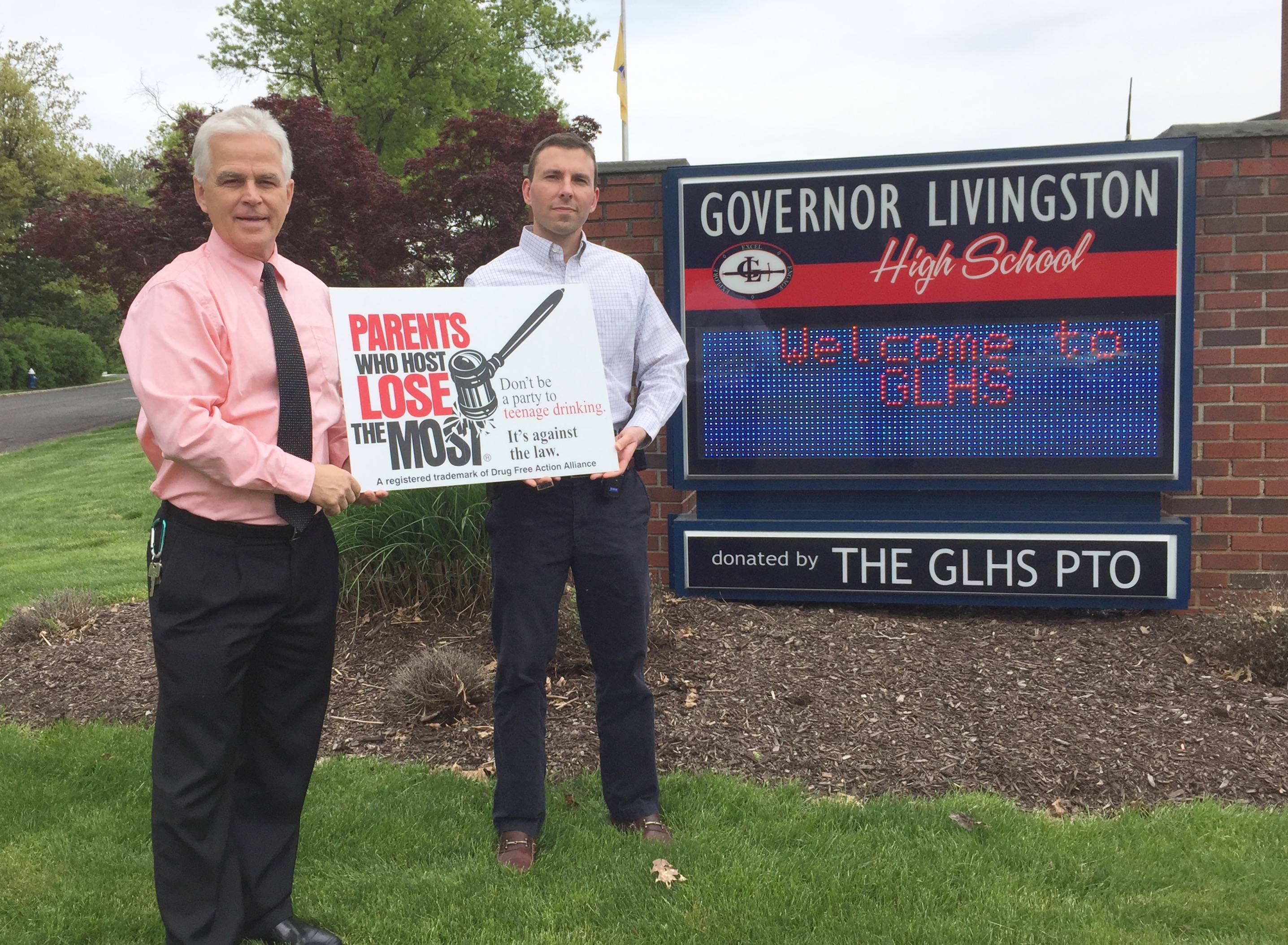 874e24a1230b393f0ffa_Bob___Shaun_w_signage___GLHS_May_11__2017.jpg