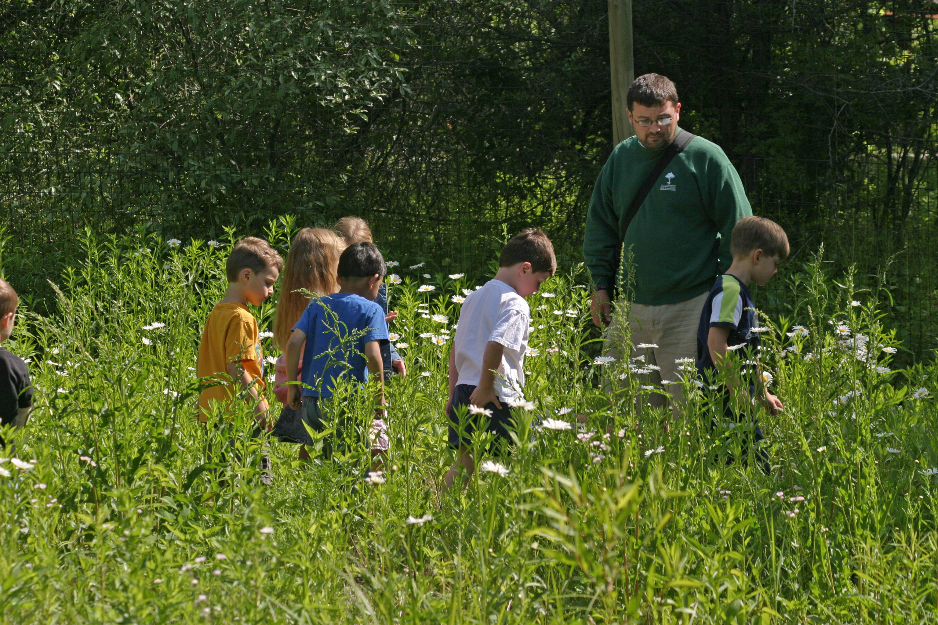 8df2153af422013324d4_Kids_in_Field.jpg