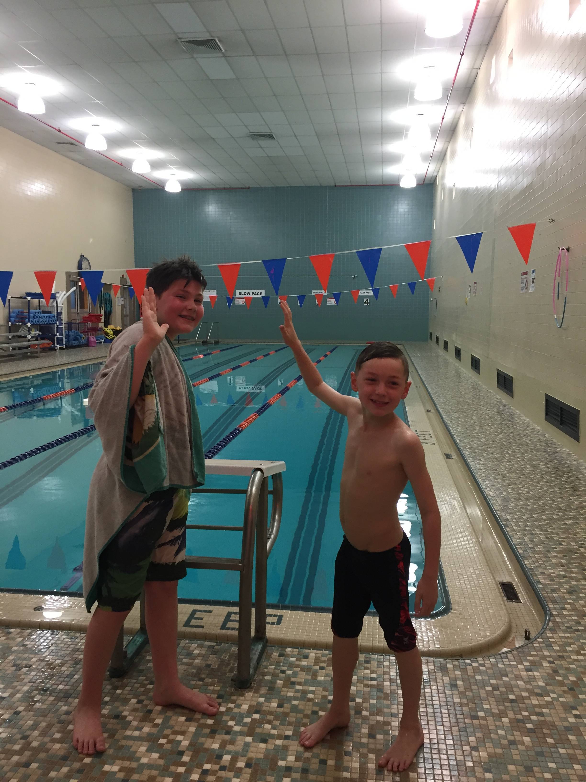 8ea7f743f5585bf22157_Swim_for_a_Cause_High_5.jpg