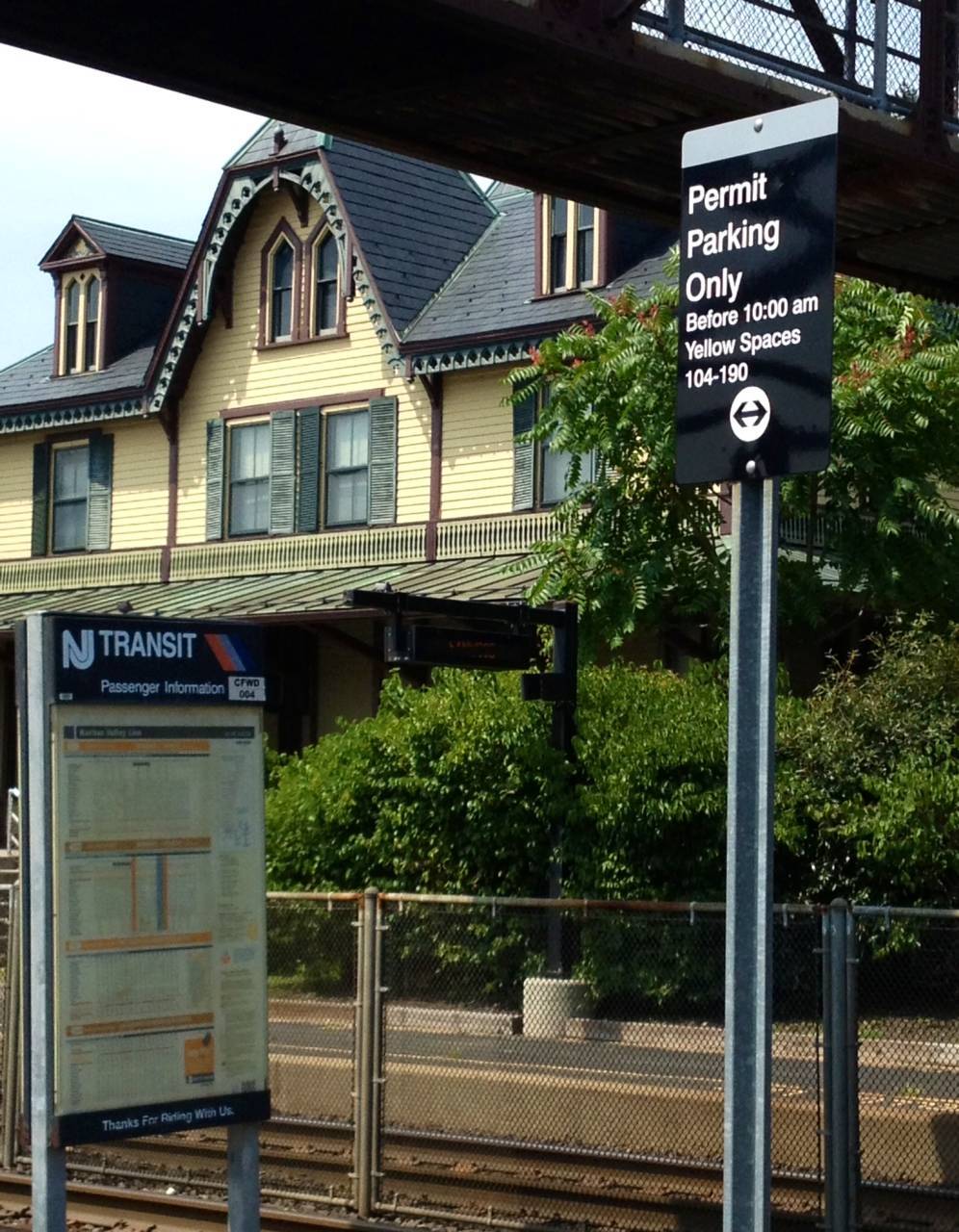 91f03a7e8948b1c8a5f5_NJT_lot_Parking_Sign_-_station_house.jpg