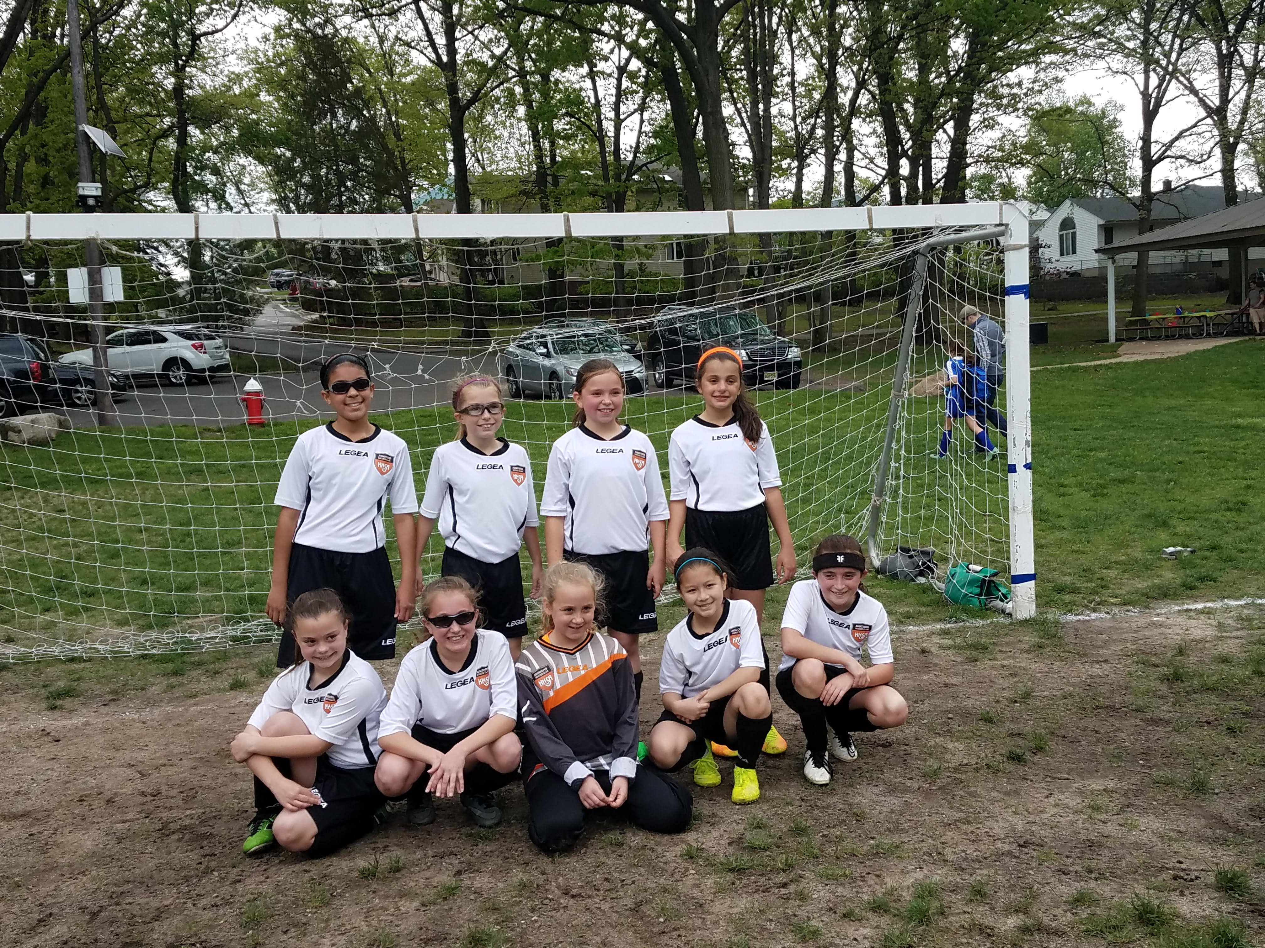 94c331f74c97d64e80c0_u10_girls_travel_soccer_team.jpg