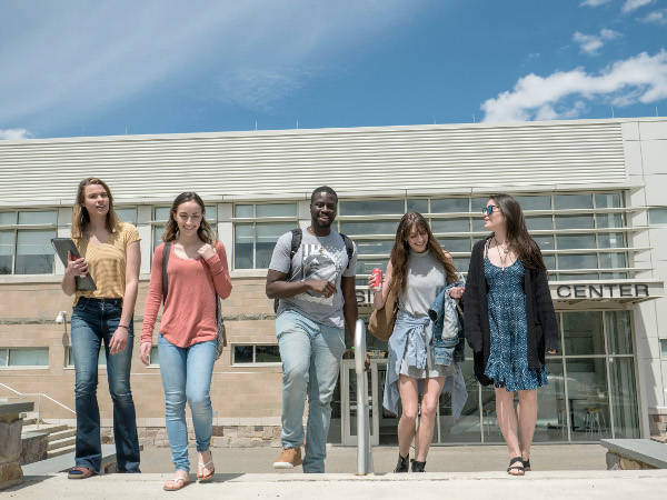 9560e01e62cea0c10626_Students_Outside_WEB.jpg