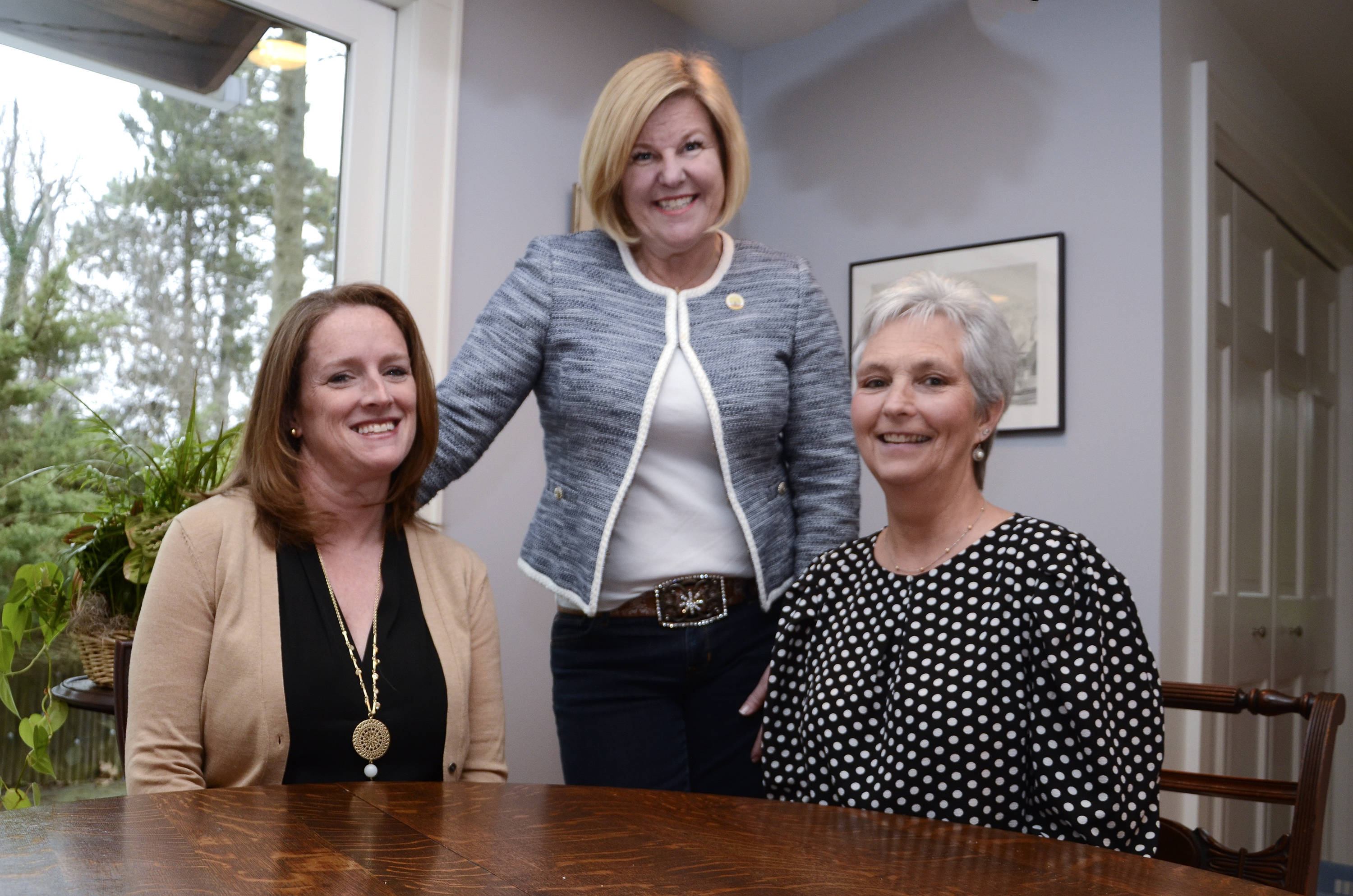 96e749bd34b36f6ad86f_Trio_at_table.jpg